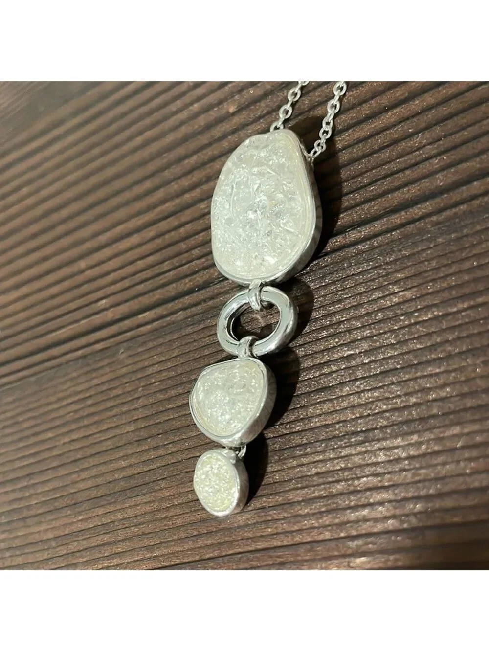 Avon White triple stone pendant with silver tone chain and removable extender
